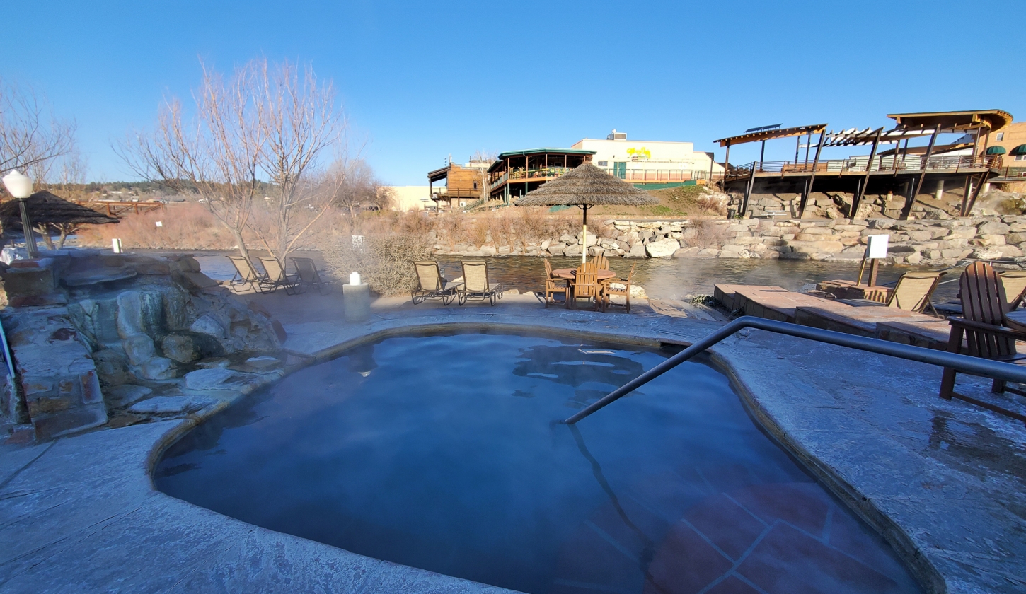 Sideway view of a hot spring pool at The Springs Resort
