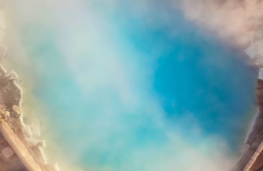 Blurred view of the steam rising from the hot spring pool at Pagosa Springs Resort