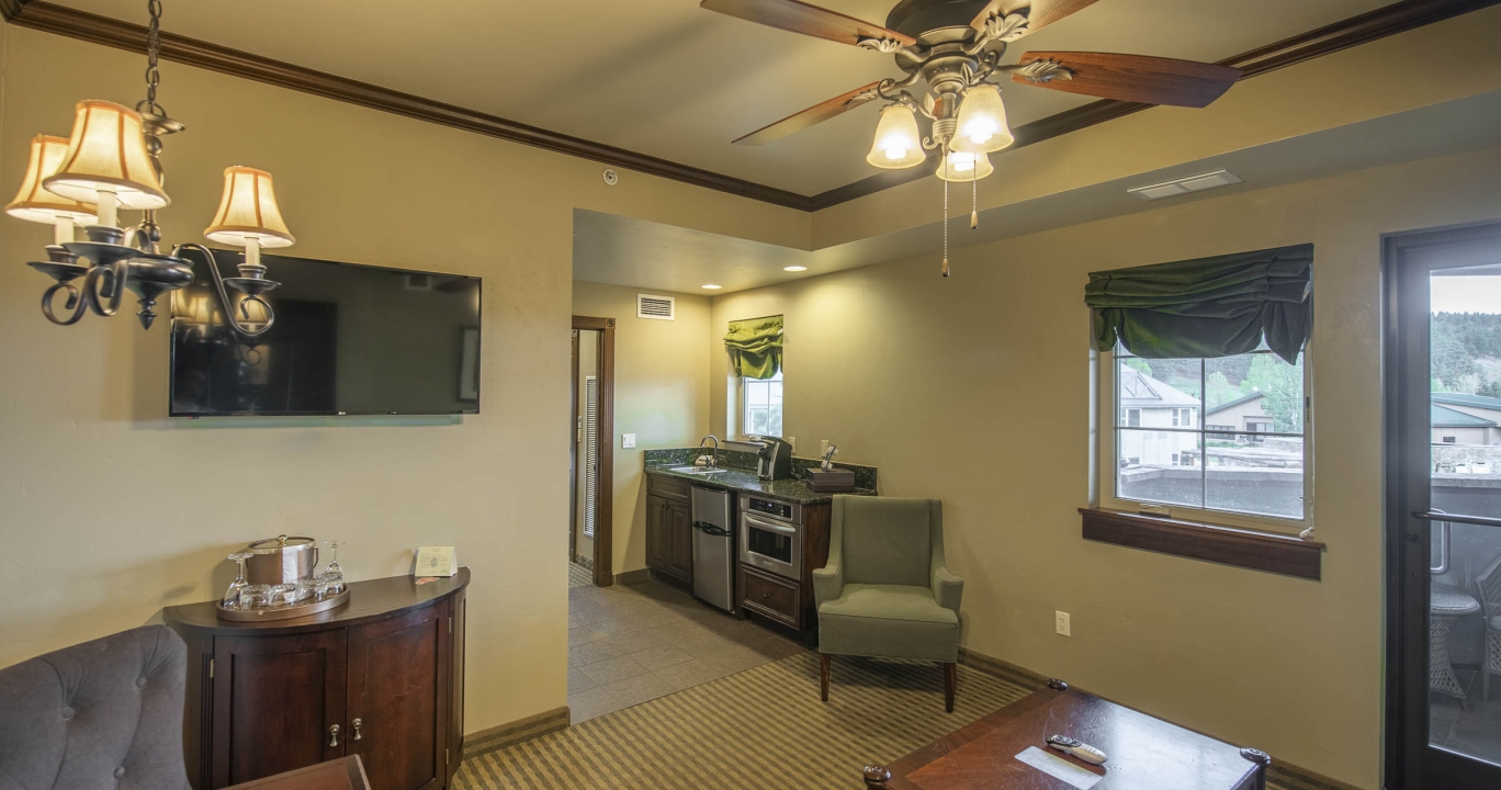 Ceiling Fan and chandelier in the luxurious living in the Mother Spring Suite on The Springs Resort